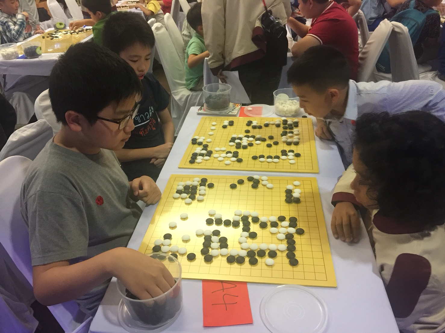 Kids competing in the Tuagom Go Tournament